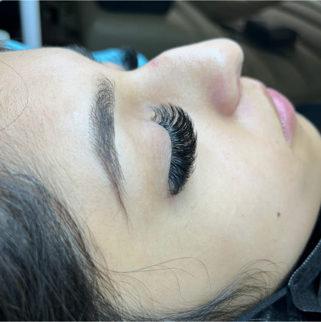 Soft, full eyelash extensions applied at Mazzy Beauty